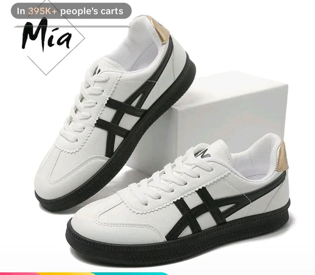 Step into style and comfort with the "Mia" sneakers! Featuring a sleek white design with bold black detailing and a subtle metallic gold heel accent, these versatile kicks are a must-have wardrobe staple. Perfect for elevating your everyday casual look. #MiaSneakers #StreetStyle #CasualKicks #SneakerHead #OOTD #FootwearFashion #DailyStyle